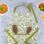 Stylish sage green apron with deep front pockets